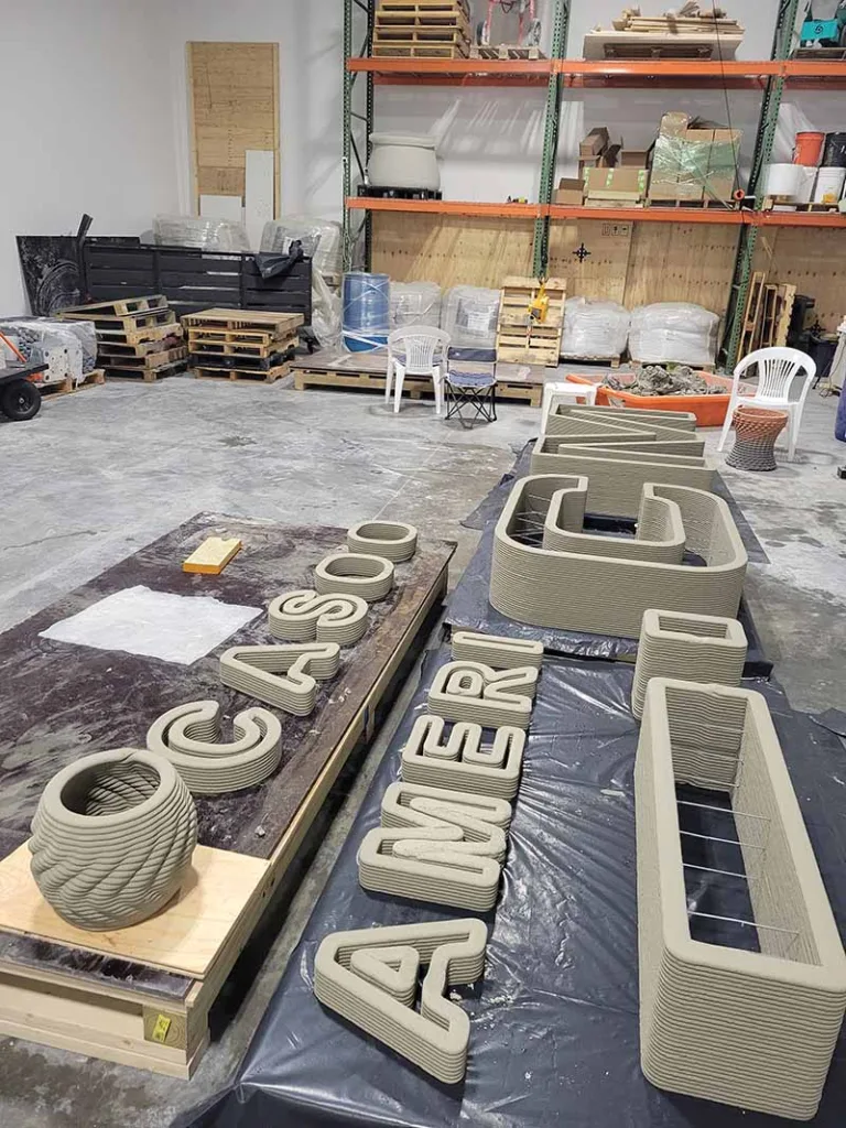 Concrete lettering for CIMSA monument sign laid out in Printera’s warehouse before installation