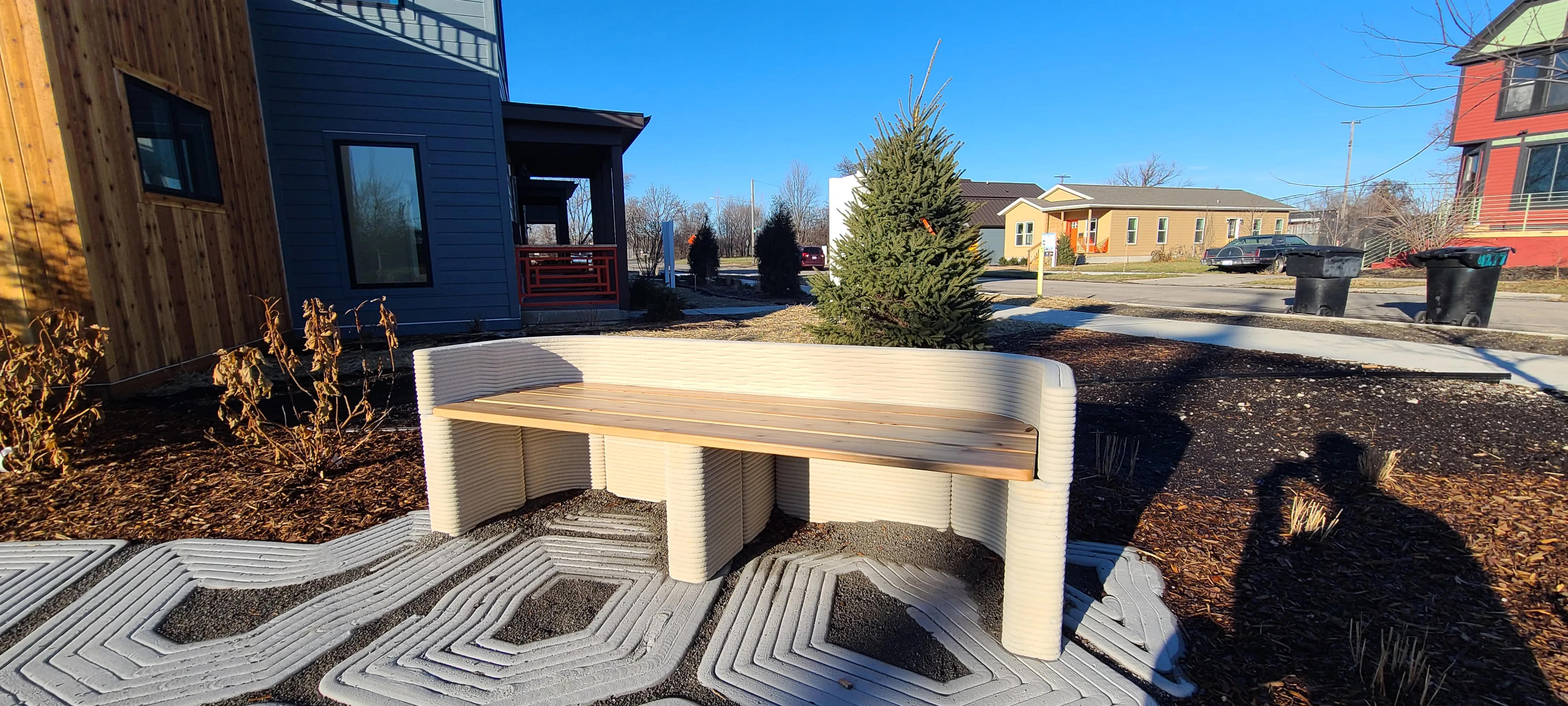 Park project featuring 3D concrete printed benches and pavers created in collaboration with Citizen Robotics.