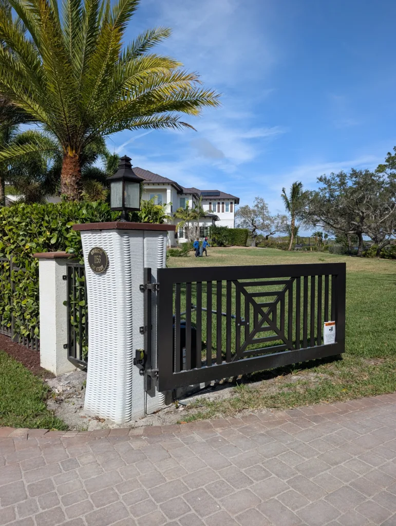 Installed gate column created with 3D concrete printing, demonstrating custom architectural detailing for landscape projects.