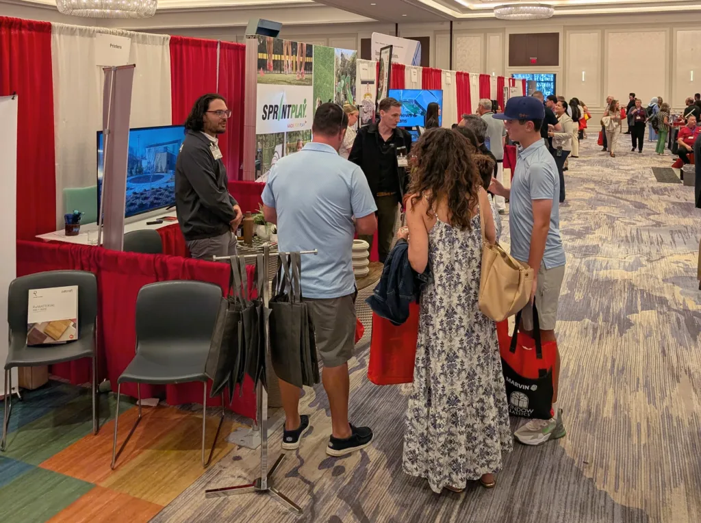 Printera’s booth at AIA Florida 2025 displaying large-scale 3D concrete printed elements.