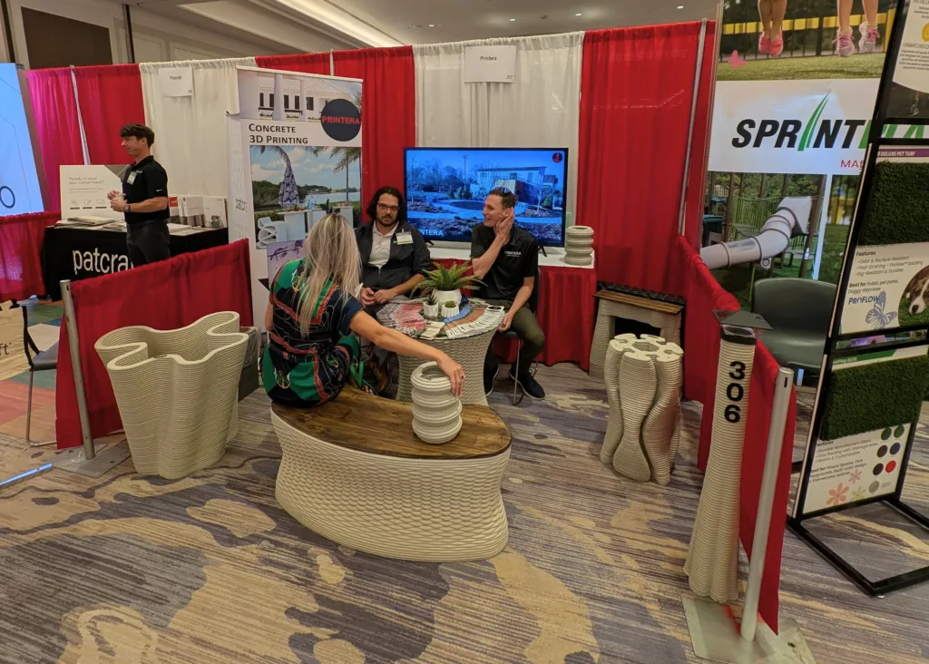 Close-up of Printera’s 3DCP trade show display at AIA Florida 2025.