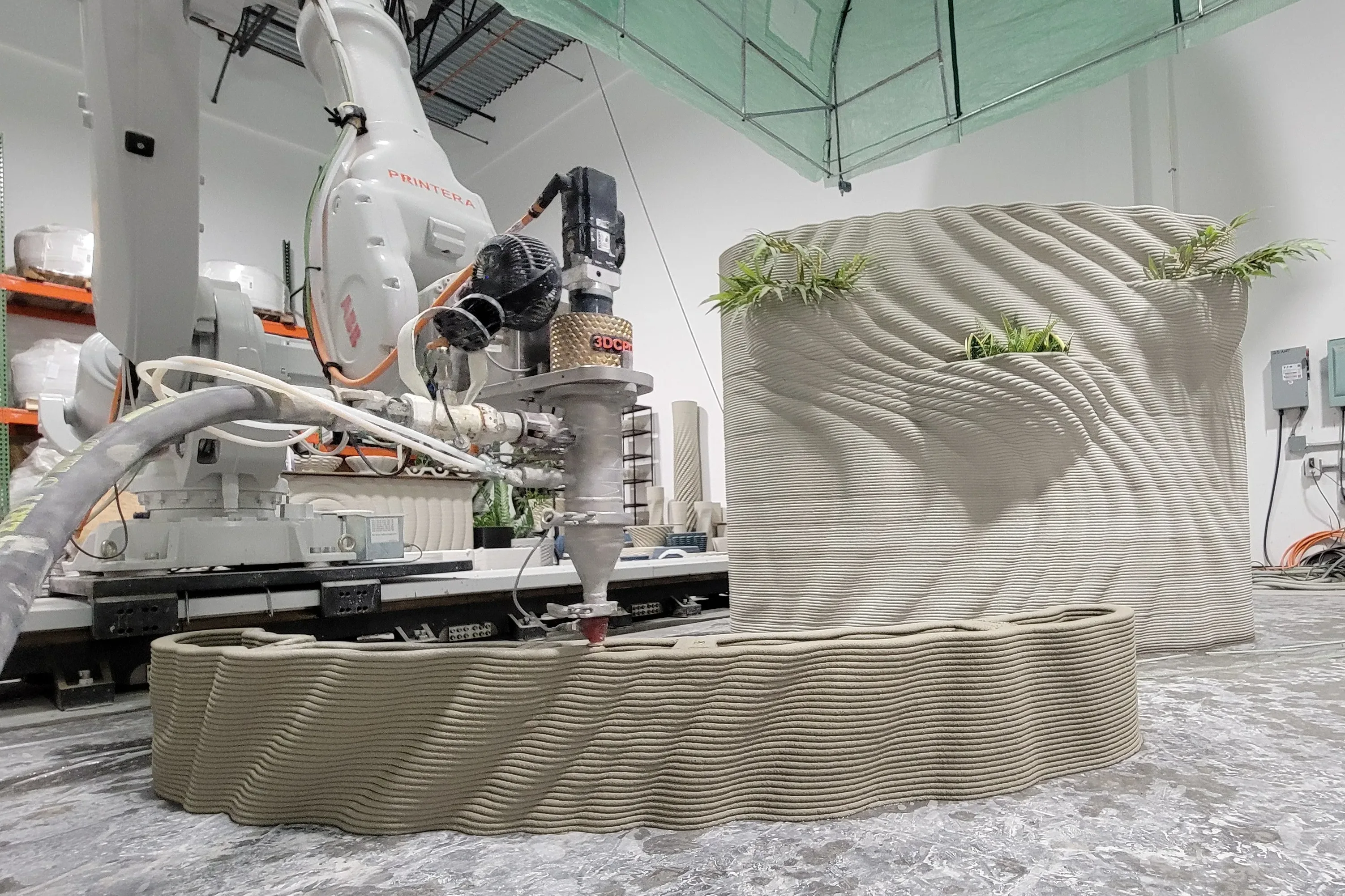 3D-printed concrete feature wall element showcasing custom texture for hospitality and commercial interior design