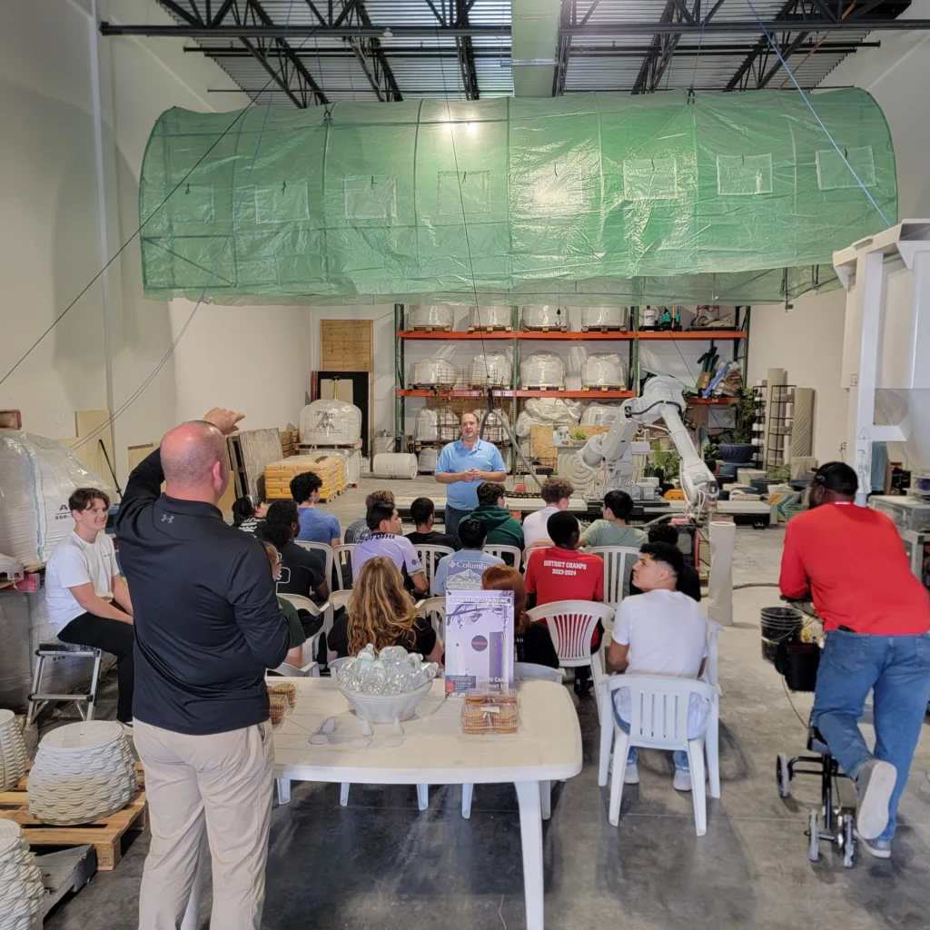 South Fork High School students attending a 3D concrete printing education presentation at Printera’s facility.