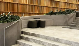 Close-up of the 3D printed concrete seating nook in the main lobby of SoMa Residences at 25 Water in New York City.