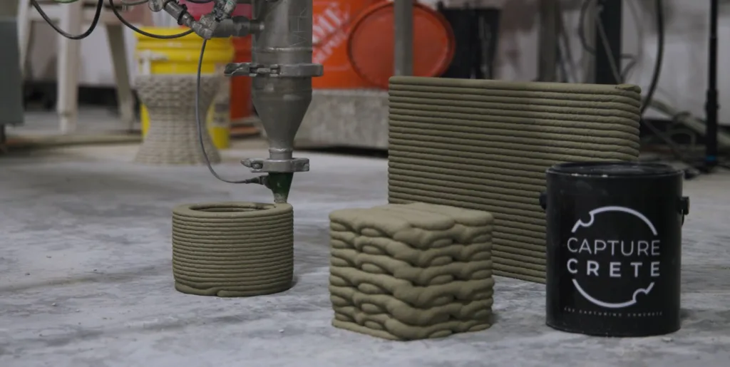 Carbon Limit CaptureCrete carbon-sequestering concrete material featured alongside 3D printed elements by Printera