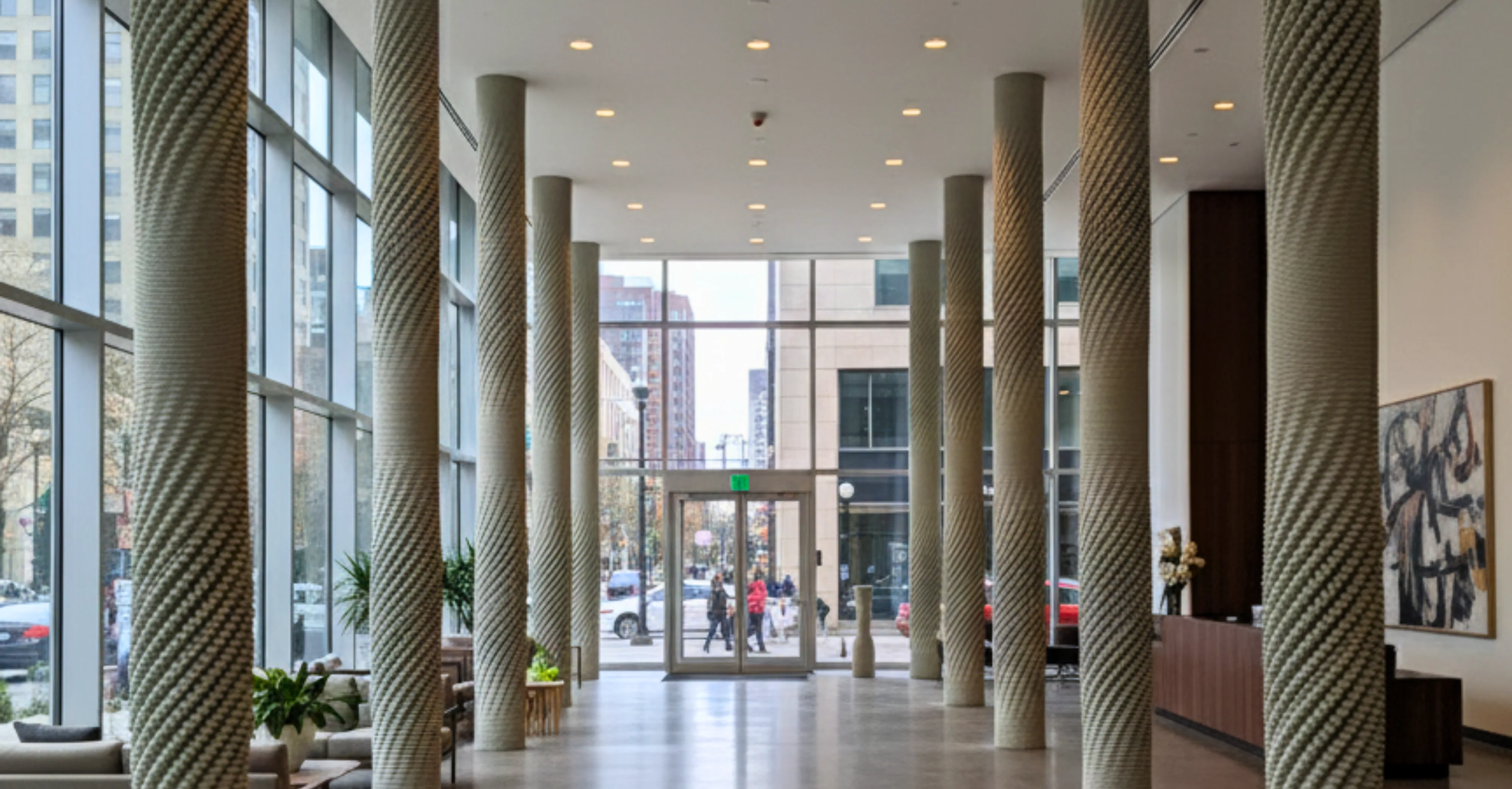 Rendered image of a concepts lobby featuring 3d concrete printed columns.